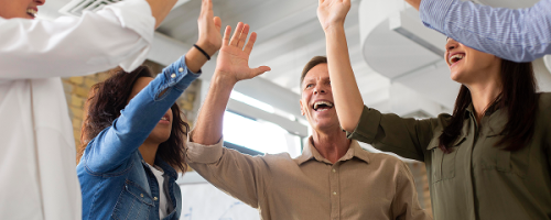 people-smiling-while-conference-rom 1